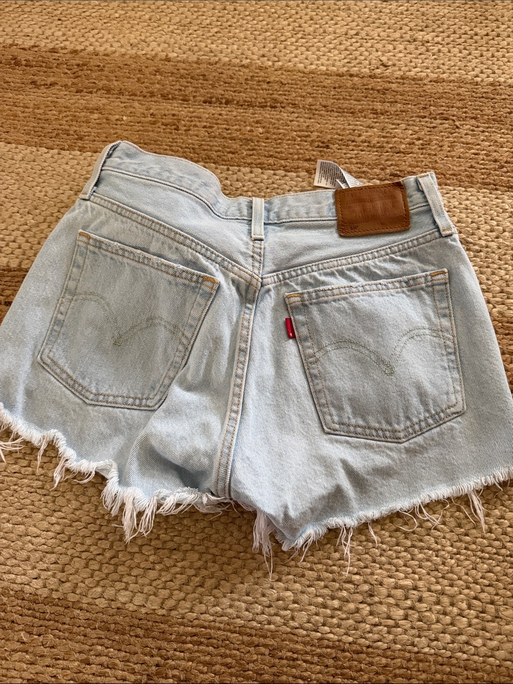 Levi's Light Wash Frayed Hem Denim Shorts